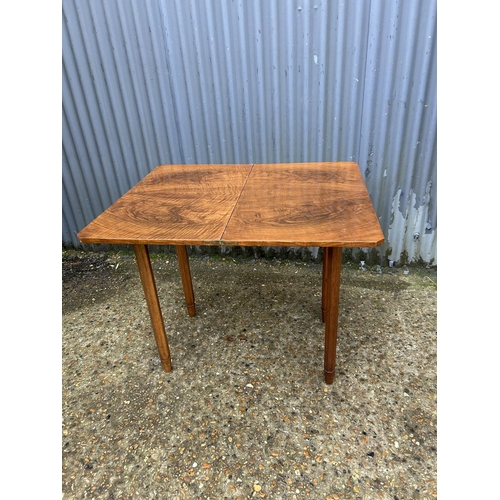 241 - A mahogany fold over tea table