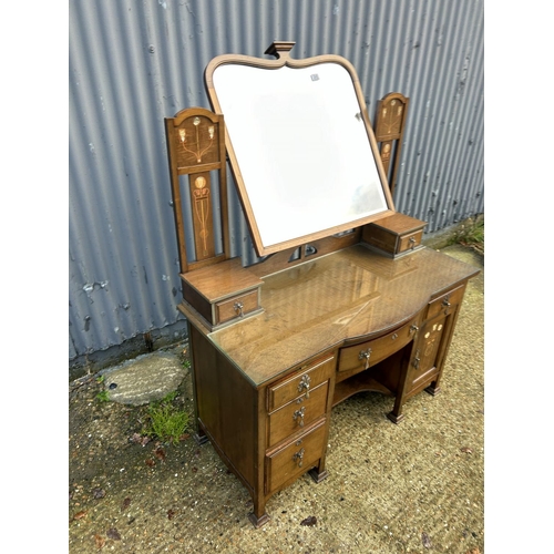 245 - Shapland & Petter, Barnstaple, a walnut kneehole dressing table circa 1900, Art Nouveau inlaid with ... 