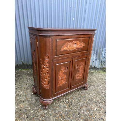 246 - A carved oriental hardwood bar/cocktail cabinet with fold over top 84x40x100