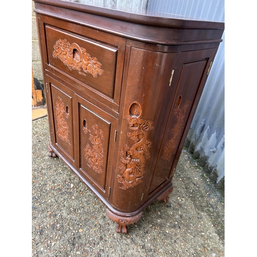 246 - A carved oriental hardwood bar/cocktail cabinet with fold over top 84x40x100