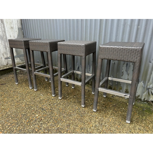 3 - A set of four contemporary grey rattan patio bar stools