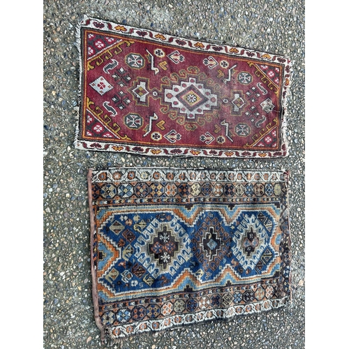 33 - Two small oriental rugs (larger 77x108)