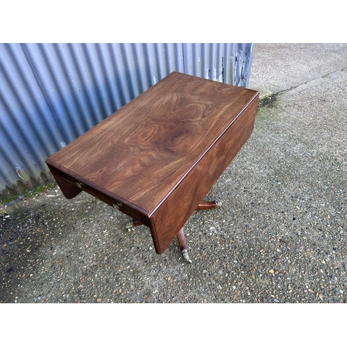 38 - A Victorian mahogany drop leaf supper table with drawer and dummy drawer 90X42X77