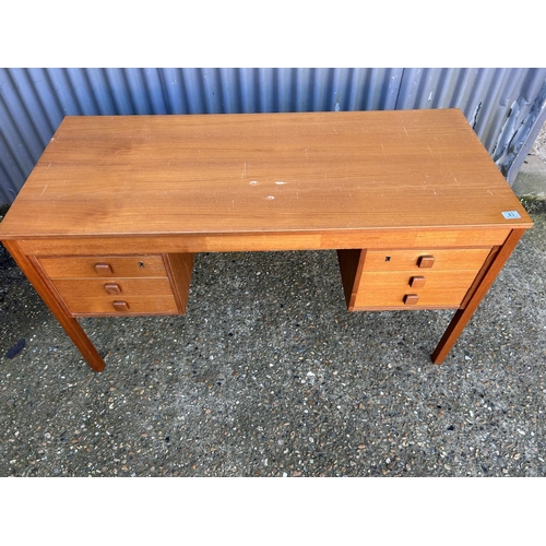 43 - A mid century teak kneehole desk 135x60x74 AF TO TOP