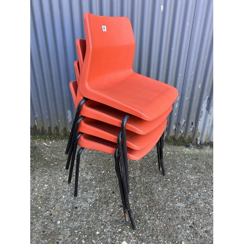 44 - A set of four stacking chairs