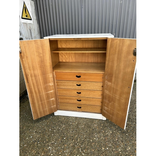 58 - A painted doctors cabinet fitted with drawers the the interior 84x50x122