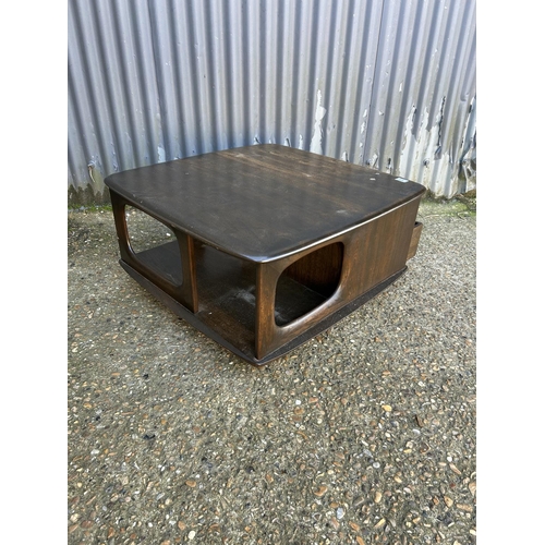 63 - An ercol Pandora two drawer coffee table in dark elm