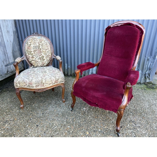 68 - A french style oak framed armchair together with a red upholstered victorian armchair