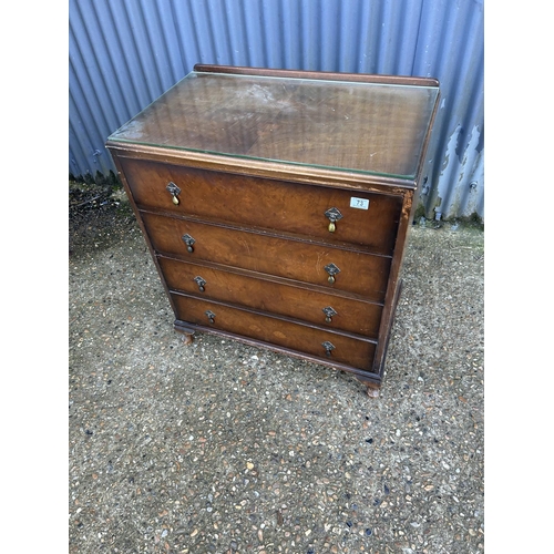 73 - A walnut chest of four drawers