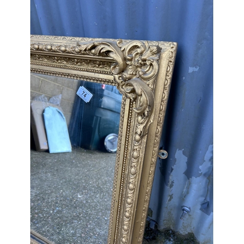 74 - A heavy gold gilt framed overmantle mirror 117x88