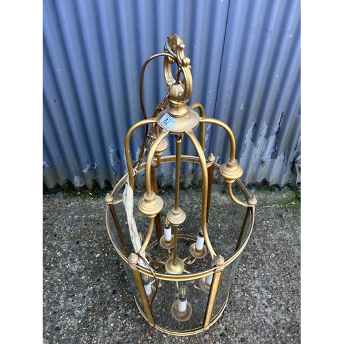 79 - A very large brass pendant lantern fitting 110cm tall