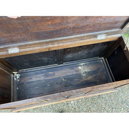 82 - A carved oak blanket box chest 116x44x60