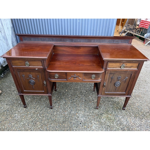 83 - A large ornate mahogany sideboard 183x55x100