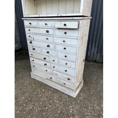 86 - An antique painted  pine chest of drawers with shelving top (base measures) 94x32x106