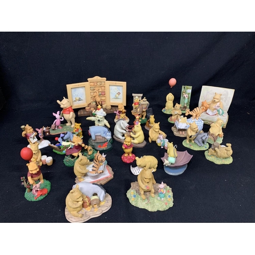 412 - Collection of 33 Assorted Winnie the Pooh figures, including 8 Border Fine Arts