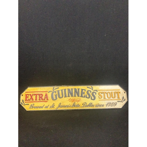 437 - Cast iron Guinness sign, length 57cms