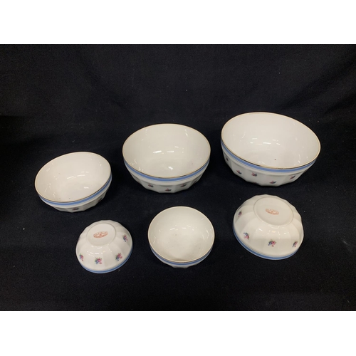 474 - Set of 6 graduated French porcelain bowls, largest diameter 23cms