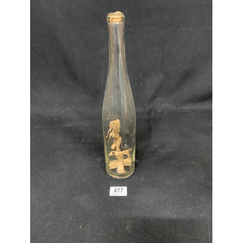 477 - Vintage carved wooden figure of a Man and a dog in a bottle, height 35cms