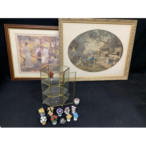 579 - Display cabinet with 12 Porcelain flowers of the year and 2 prints (3)