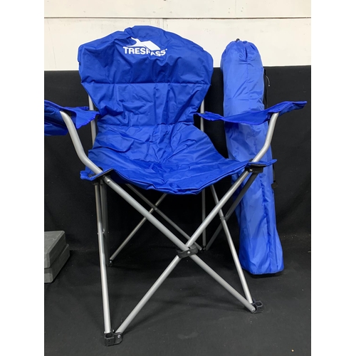 586 - 2 new unused Trespass portable fold up chairs in carry cases