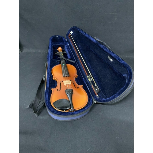 631 - Cased Childs violin and bow - Intermusic student