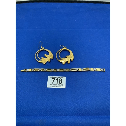 718 - A Joan Rivers Bracelet and pair of large Dauphaise Earrings