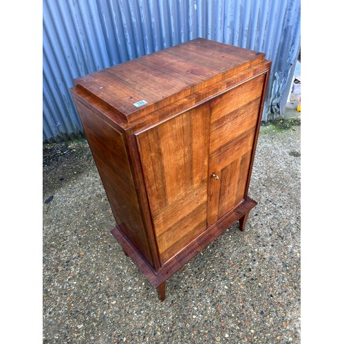 185 - A french mahogany cupboard with adjustable shelves to the interior70x40x120