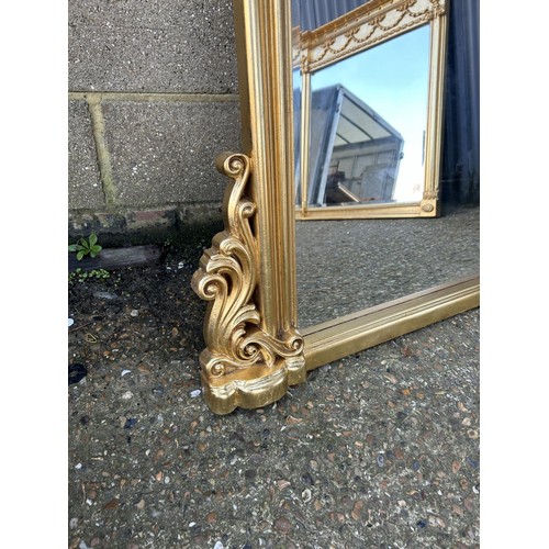 191 - A large gold gilt framed overmantle mirror 120x120cm