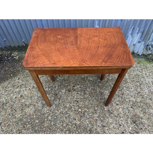 241 - A mahogany fold over tea table