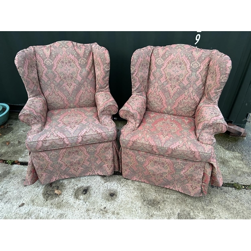 256 - A pair of good quality wing back armchairs with removable loose covers