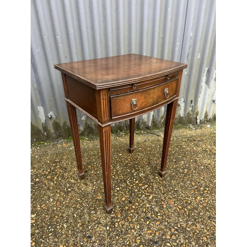 109 - A repro mahogany side table