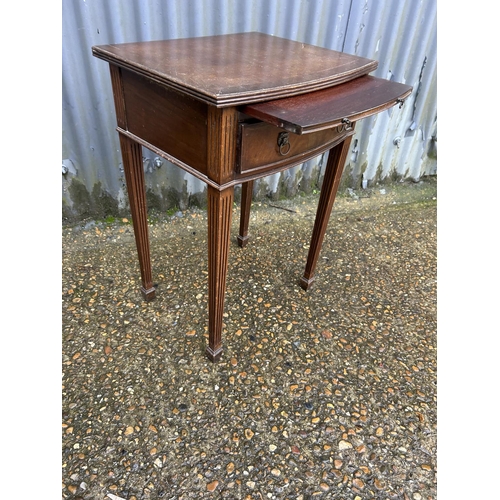 109 - A repro mahogany side table