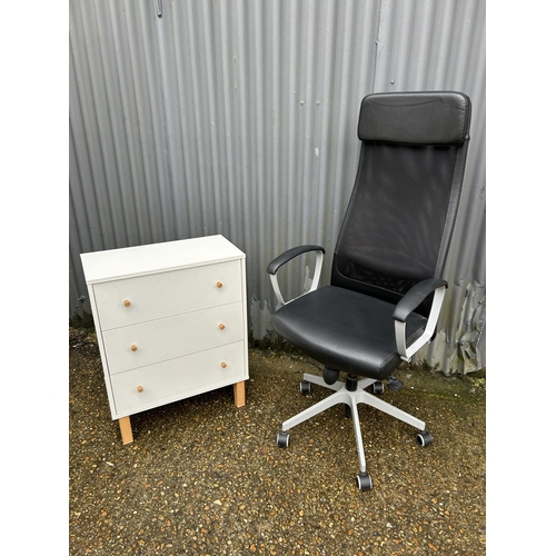 110 - A modern swivel office chair together with a modern chest of three drawers