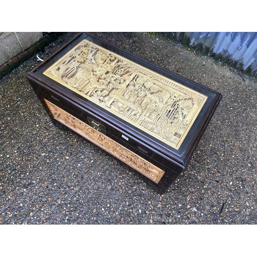 119 - An oriental highly carved camphorwood banket box trunk  100x50x60