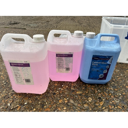 139 - Two bottles of fog fluid and a bottle of glass wash