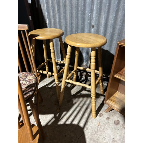 147 - A retro cabinet, two stools and two stickback chairs