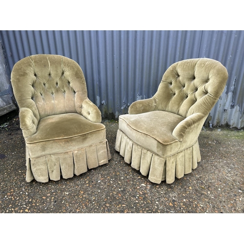 172 - A pair of green upholstered button back bedroom chairs