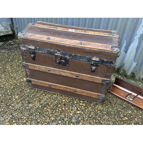 180 - A vintage dome top trunk and a coat fillet