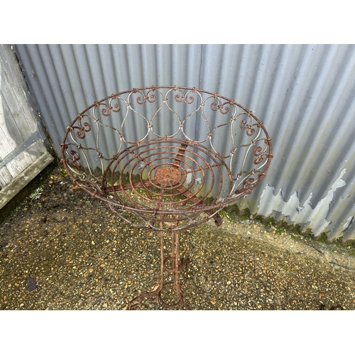 185 - A pair of vintage metalwork ornate plant stands 107cm tall