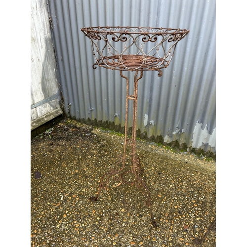 185 - A pair of vintage metalwork ornate plant stands 107cm tall