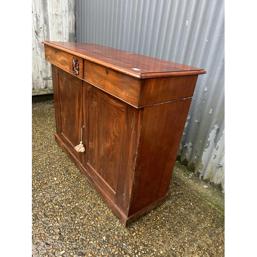 186 - A continental mahogany two drawer and two door sideboard 109x47x92