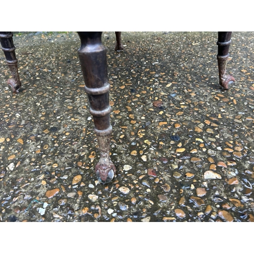 187 - A continental mahogany square occasional table with decorative glass eagles feet /glass ball feet 59... 