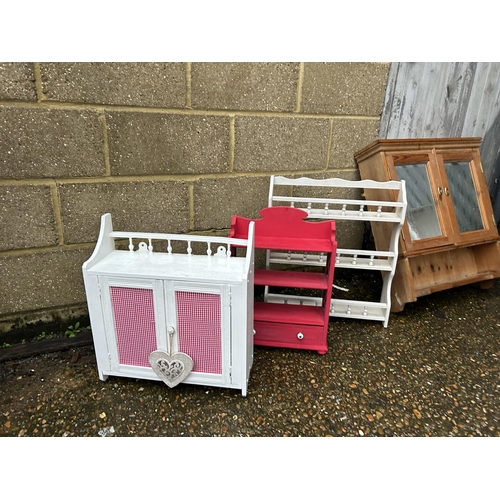 199 - A painted bedside, four wall shelves, stool, basket and bookrack