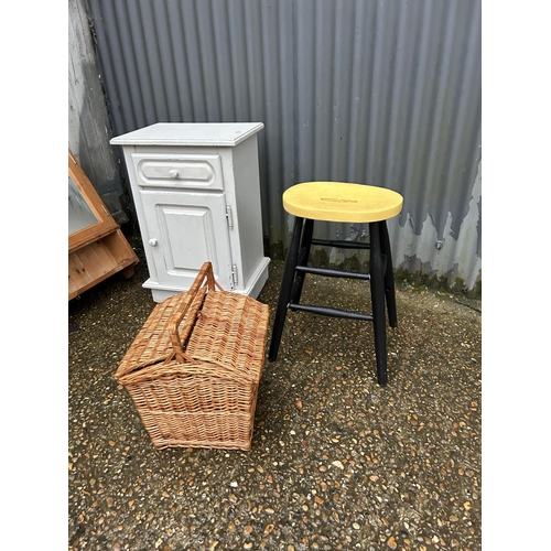 199 - A painted bedside, four wall shelves, stool, basket and bookrack