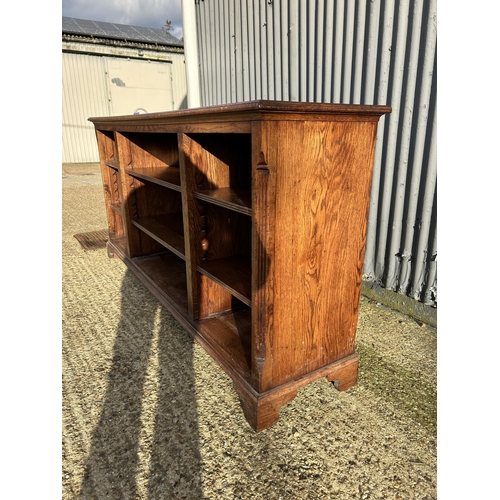2 - A reproduction oak open fronted bookcase 206x50x95