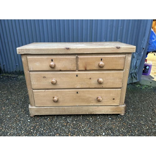 201 - A pine chest of four drawers 103x45x75