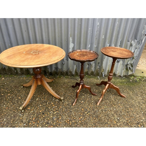 206 - Four circular mahogany occasional tables