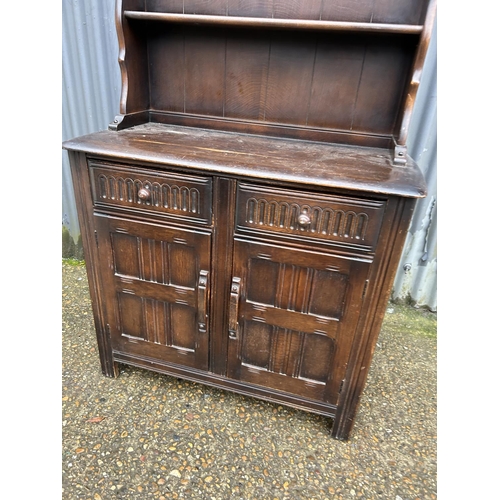 212 - An oak cottage style dresser