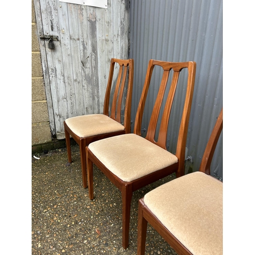 220 - A set of four nathan teak dining chairs