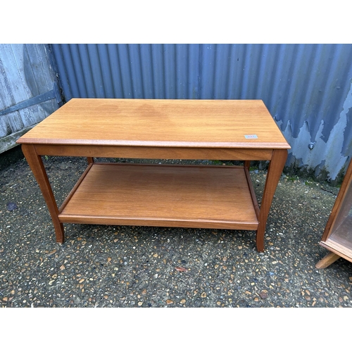 221 - A teak coffee table and a retro bookcase